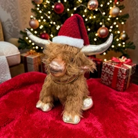 Large Sitting Gold Highland Cow