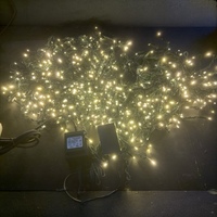 50M Warm White LED Icicles on a Green Wire